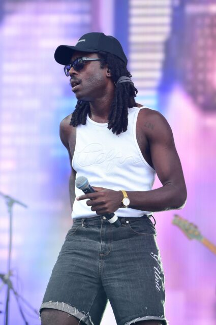 Dev Hynes Performing On Stage In Casual Outfit