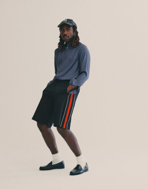 Dev Hynes Stylish Outfit Wallpaper For Modern Aesthetics