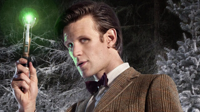 The Doctor played by Matt Smith holding a glowing sonic screwdriver in a snowy forest, HD Desktop Wallpaper