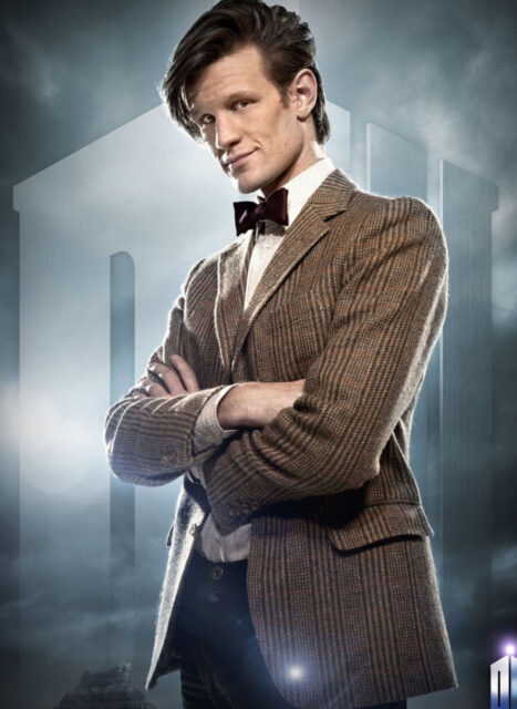 Doctor Who Matt Smith is standing confidently with arms crossed in front of a sci fi background, HD PC Wallpaper