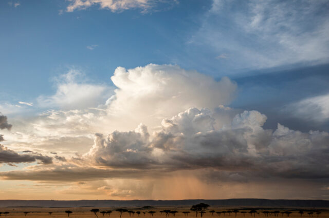 Dramatic Clouds And Sky Over Burundi Landscape Wallpaper