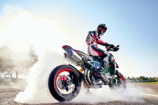 Ducati Hypermotard 950 Performing a Smoke Burnout Action Wallpaper
