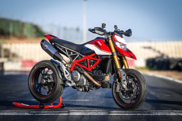 Ducati Hypermotard 950 Red and White Motorcycle on Race Track Wallpaper