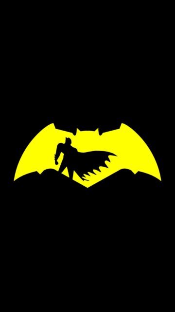 Dynamic Batman Silhouette On Yellow Background Wallpaper