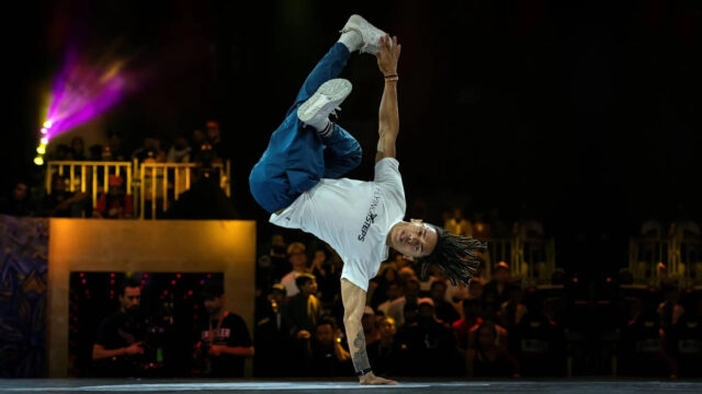 Dynamic Breakdancing Move In Action Wallpaper