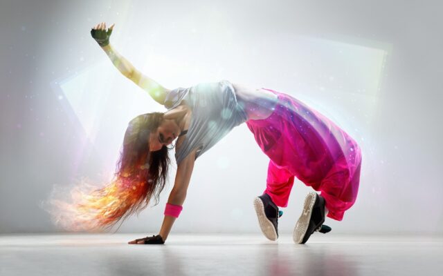 Dynamic Breakdancing Pose Colorful Wallpaper