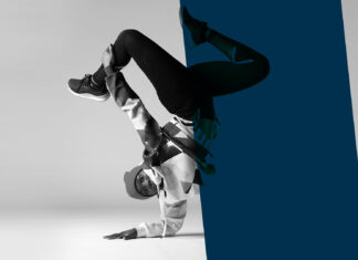 Dynamic Breakdancing Pose Wallpaper In Black And White