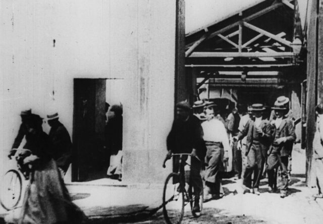 Early Film Pioneer Scene By Lumiere Brothers Wallpaper