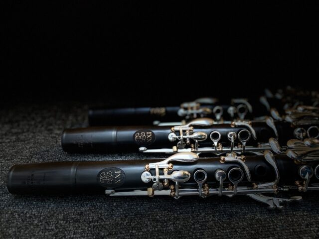 Elegant Clarinet Display In Dark Background Wallpaper