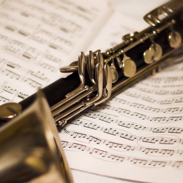 Elegant Clarinet On Music Sheets Perfect For Wallpapers