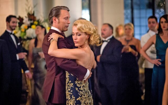 Elegant Dance Scene Featuring Mads Mikkelsen Wallpaper