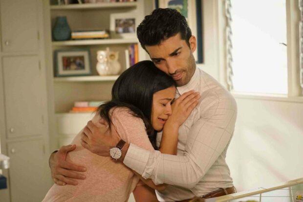 A heartfelt scene from Jane The Virgin shows two characters hugging tightly in a comforting embrace, 2K Desktop Wallpaper