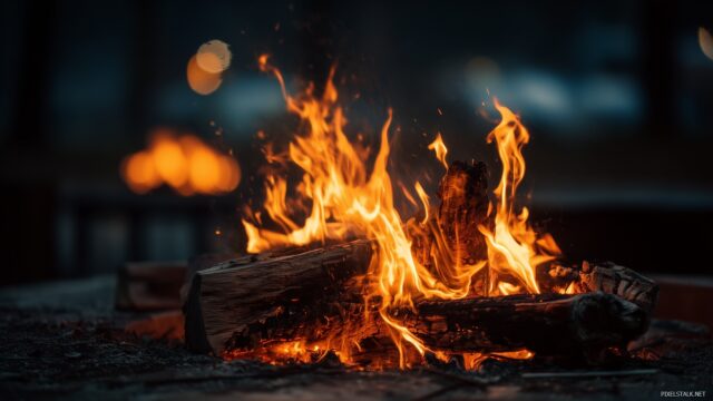 Fire Wallpaper HD Free Download, A Mesmerizing Visual Of Firelight Illuminating Dark Surroundings, Creating An Inviting Atmosphere For Any Desktop Setting