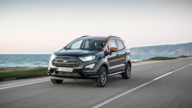 Ford EcoSport Driving Along Scenic Coastal Road Wallpaper