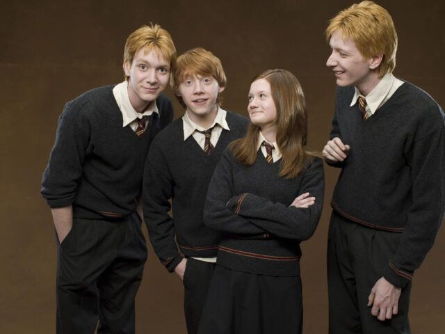 Fred And George Weasley Wallpaper With Friends And Family In Hogwarts Uniforms