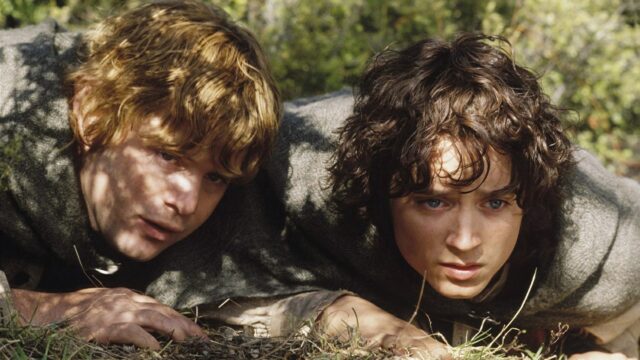 Frodo And Sam In Middle Earth Adventure Wallpaper
