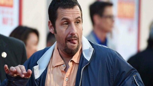 Adam Sandler is making a funny face at an event, HD Desktop Wallpaper