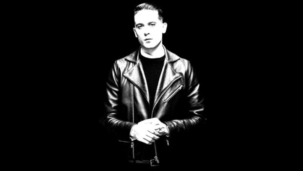 G Eazy is standing wearing a leather jacket against a black background, HD Desktop Wallpaper
