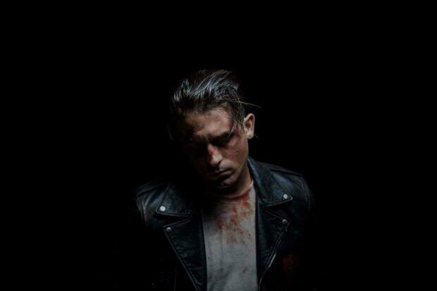A close up portrait of G Eazy wearing a leather jacket in dramatic lighting, HD Desktop Wallpaper
