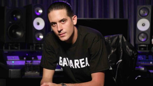 G Eazy wallpapers shows a young man in a music studio surrounded by speakers and equipment, HD Desktop Wallpaper