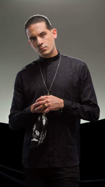 G Eazy stands confidently wearing a black shirt and accessories, 4K Phone Wallpaper