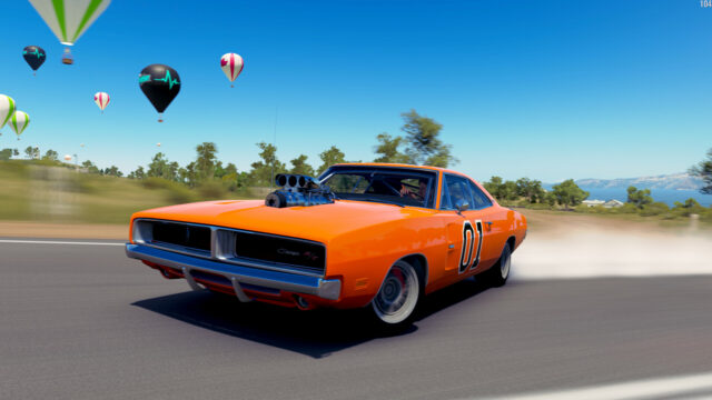 General Lee Dodge Charger Car Drifting on Road with Hot Air Balloons Background