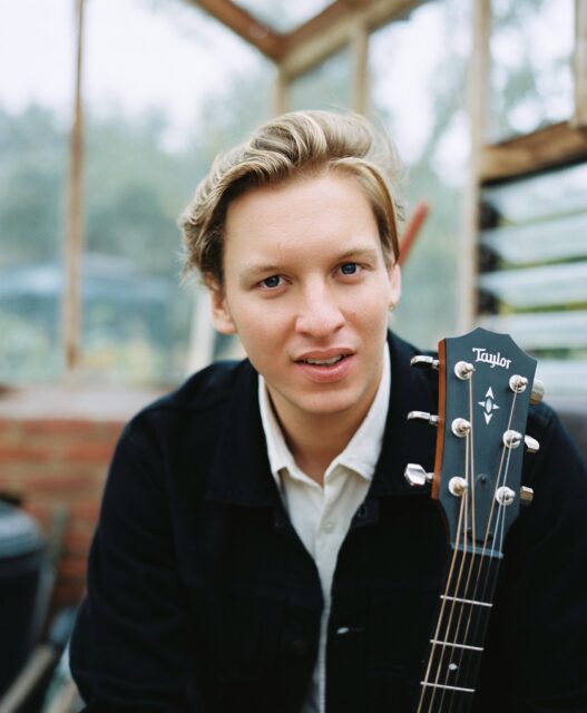 George Ezra Acoustic Guitar Portrait Natural Light Wallpaper