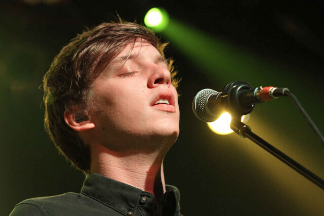 George Ezra singing passionately live performance wallpaper
