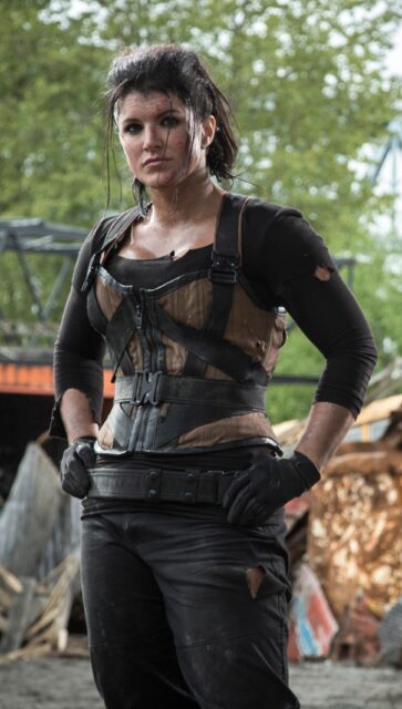 Gina Carano Action Character in Combat Outfit Outdoor Wallpaper