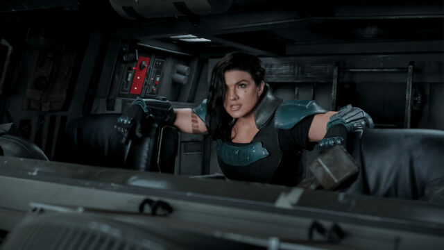 Gina Carano intense action pose inside futuristic vehicle for wallpapers