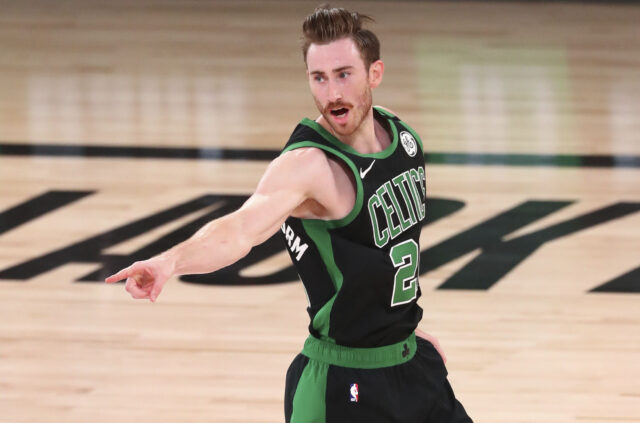 Gordon Hayward in Boston Celtics Jersey Pointing on Basketball Court Wallpaper