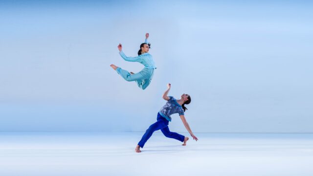 Graceful Contemporary Dance Performance with Two Dancers in Blue Tones Wallpaper