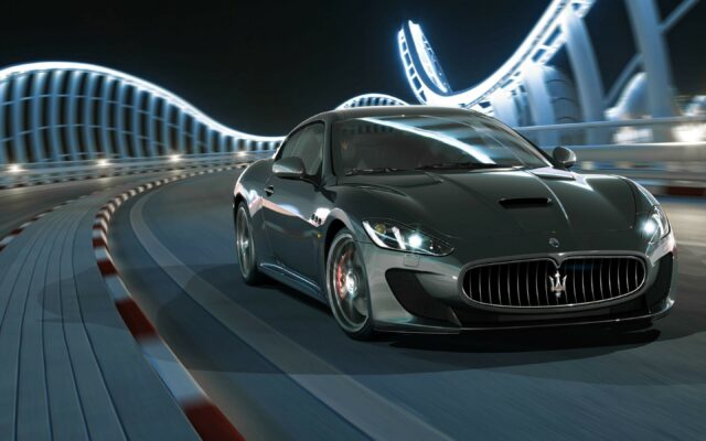 Gran Turismo 7 Racing Car Wallpaper In Futuristic Track