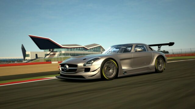 Gran Turismo 7 Wallpaper Silver Race Car On Track