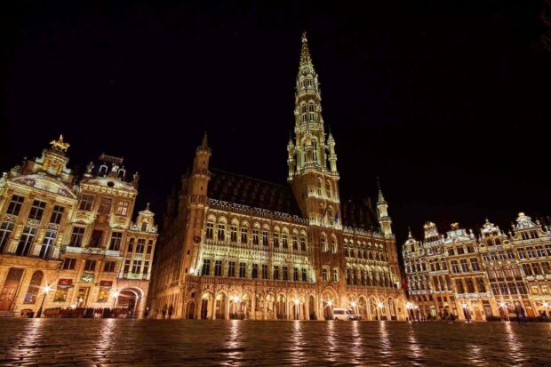 The historic Grand Place in Brussels is beautifully illuminated under the night sky, showcasing its gothic architecture, Brussels Wallpapers, HD Desktop Wallpaper