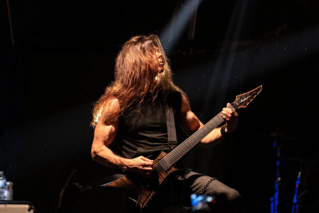 Guitarist Performing Live For In Flames Band Wallpaper