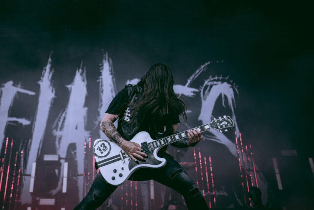 Guitarist Of In Flames Performing Live On Stage Wallpaper