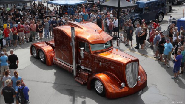 HD big truck wallpaper collection, a custom big truck displayed at a car show surrounded by enthusiastic fans.