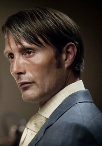 A close up of Hannibal Mads Mikkelsen wearing a suit and tie looking serious, HD Mobile Wallpaper