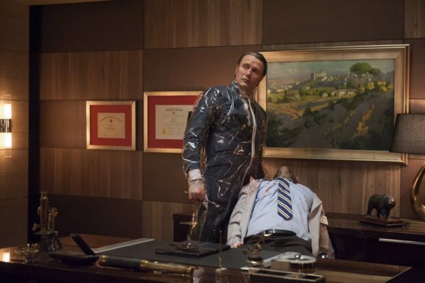 Hannibal Mads Mikkelsen stands in a plastic suit beside a man in an office setting, 2K Desktop Wallpaper