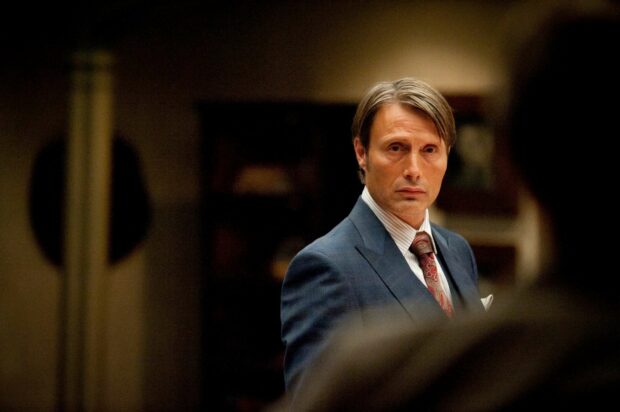 Mads Mikkelsen portrays a serious character in Hannibal with a focused expression, HD Desktop Wallpaper