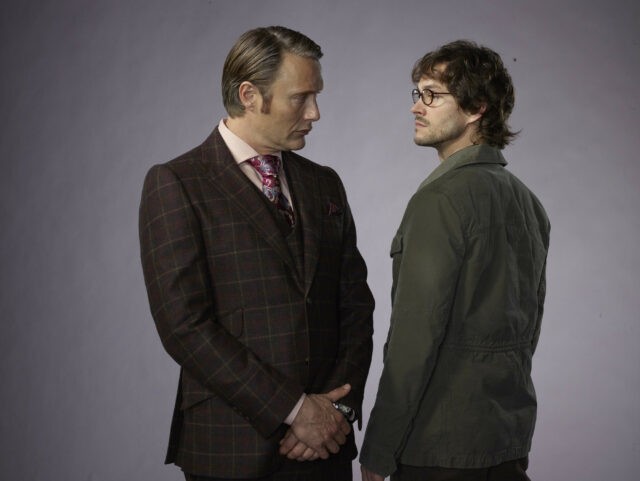 Hannibal TV Series Wallpaper Featuring Intense Moment Between Hannibal Lecter and Will Graham
