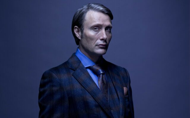 Hannibal TV Series Wallpaper Featuring Intense Portrait of Mads Mikkelsen in Dark Suit