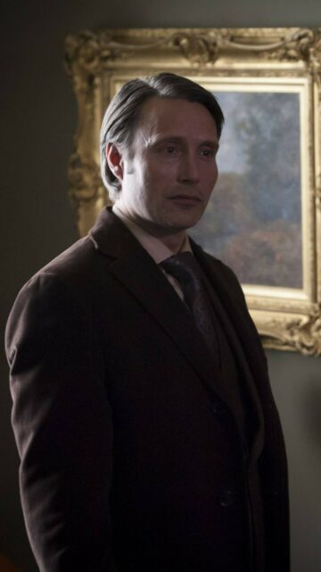 Hannibal TV Series Wallpaper Featuring Mads Mikkelsen as Dr Hannibal Lecter in Dark Setting