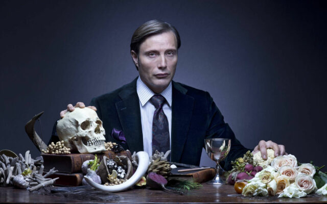 Hannibal TV Series Wallpaper Featuring Mads Mikkelsen with Skull and Elegant Table Setting