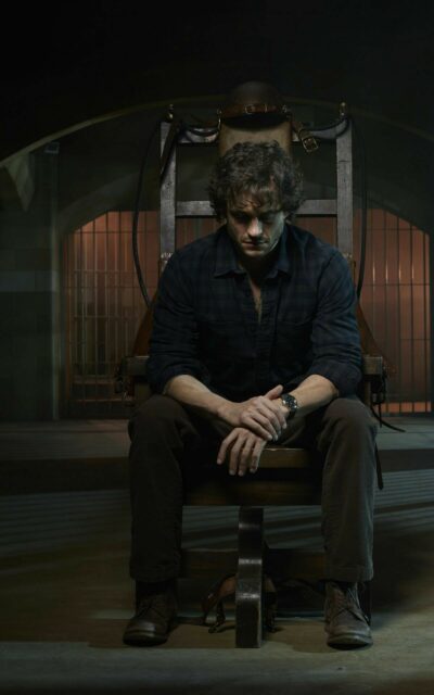 Hannibal TV Series Wallpaper Suspenseful Moment with Man in Electric Chair