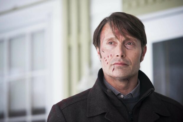 Hannibal Mads Mikkelsen wallpapers show the character with wounds on his face in a thoughtful expression