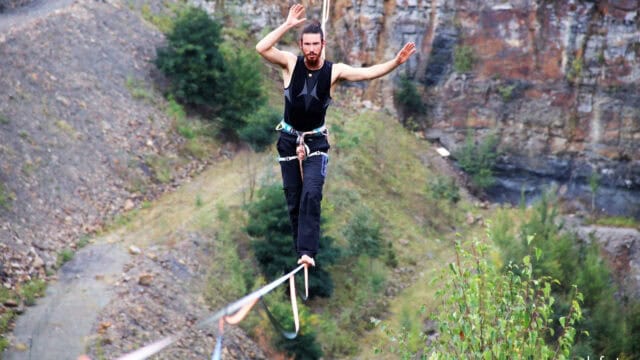 Highline Slackliner Balancing on Slackline Above Nature Landscape Wallpapers