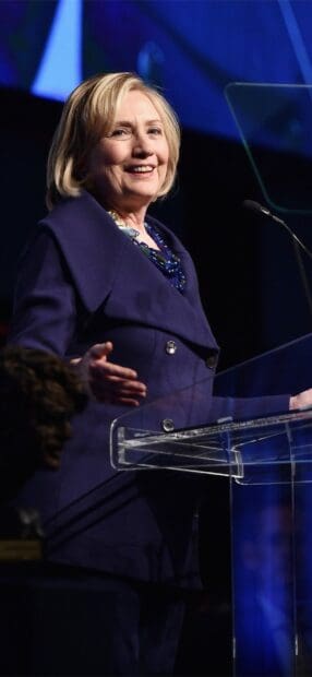 Hillary Clinton is confidently speaking at a podium during an event, HD Phone Wallpaper