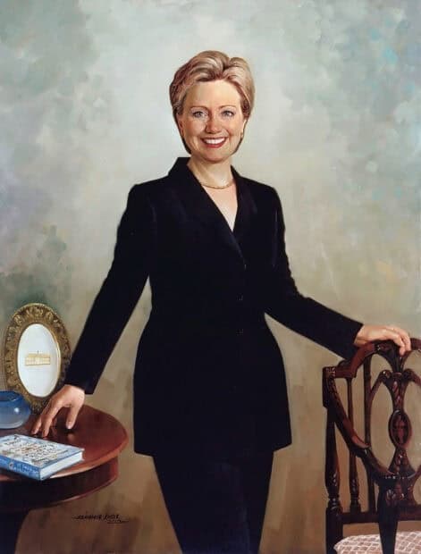 Hillary Clinton wallpapers feature a confident woman standing by a table and chair, HD Desktop Wallpaper